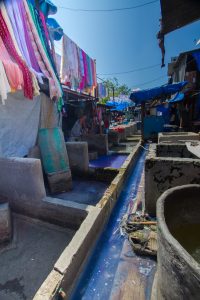 Colourful dyes running through channels at Dhobi Ghat, Mumbai