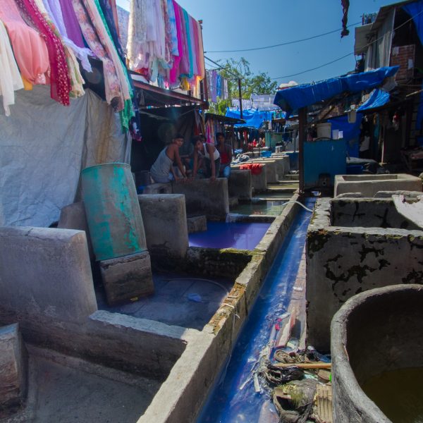 Colourful dyes running through channels at Dhobi Ghat, Mumbai