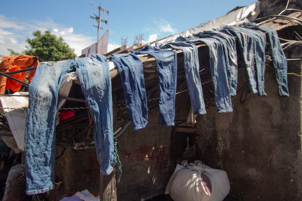 Jeans drying at Dhobi Ghat outdoor laundry, Mumbai