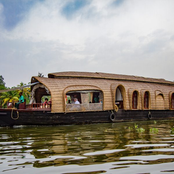 A houseboat cruising the Kerala backwaters, Allepey, India